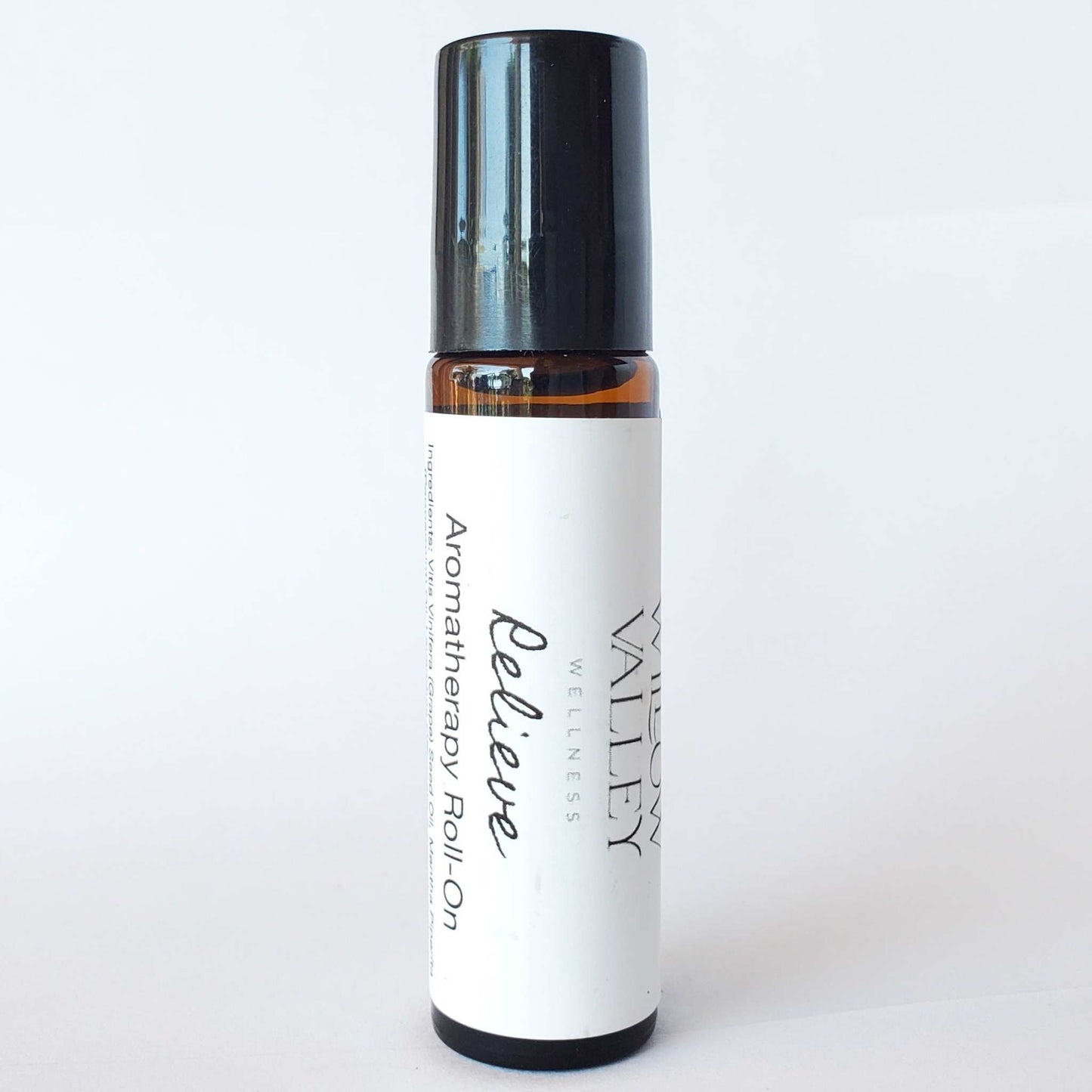 Relieve essential oil roll-on with peppermint, eucalyptus, rosemary, lavender, and ginger in jojoba oil