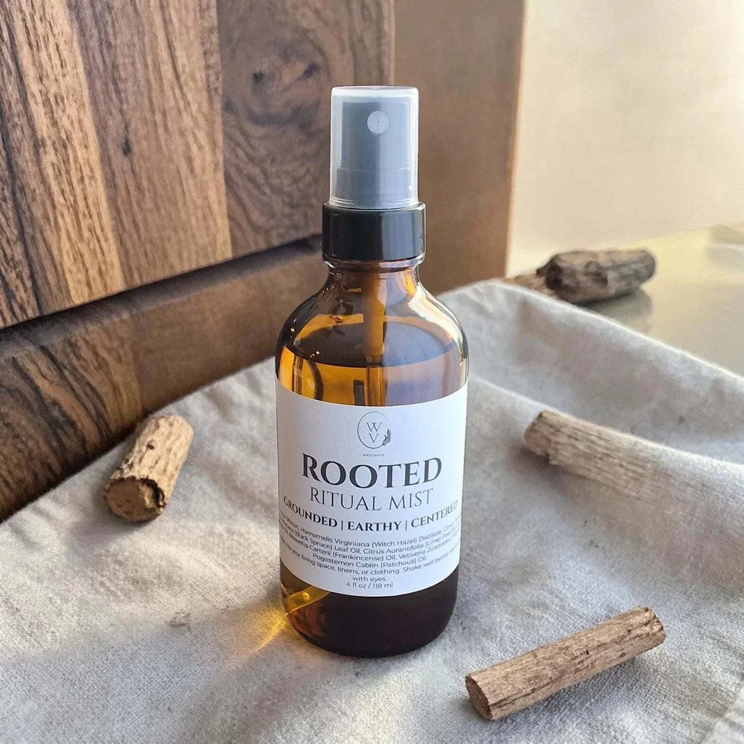 Rooted Ritual Mist warm woody linen spray for home, quiet spaces, and everyday evening rituals.