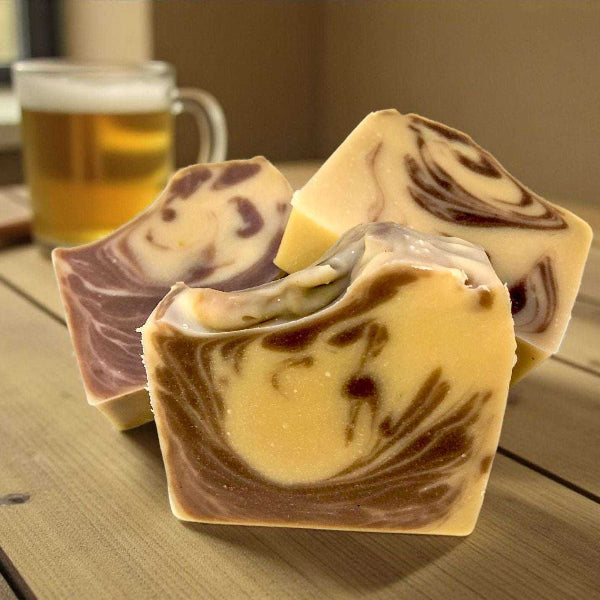 Smoky Pilsner Soap made with Pilsner ale and rich oils, featuring woodsy citrus notes for a bold, refreshing cleanse.