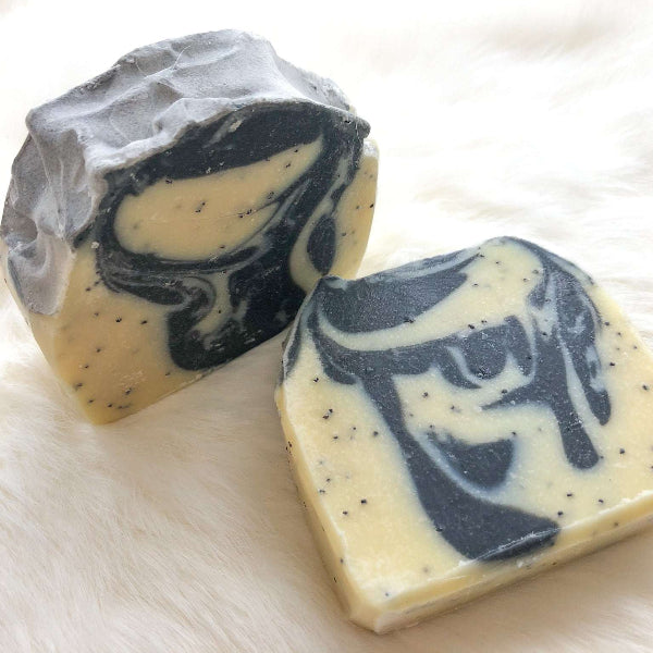 Bar of Rejuvenate Soap with poppy seeds and activated charcoal for exfoliating and refreshing skin care