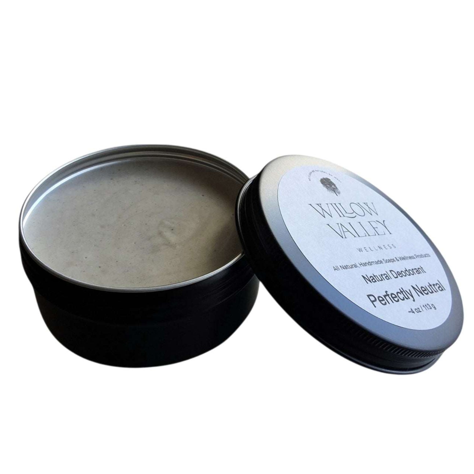 Open tin of natural deodorant paste with a smooth wax-free formula in a black metal container