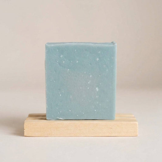 Creamy Clay cold process soap bar on a light neutral background