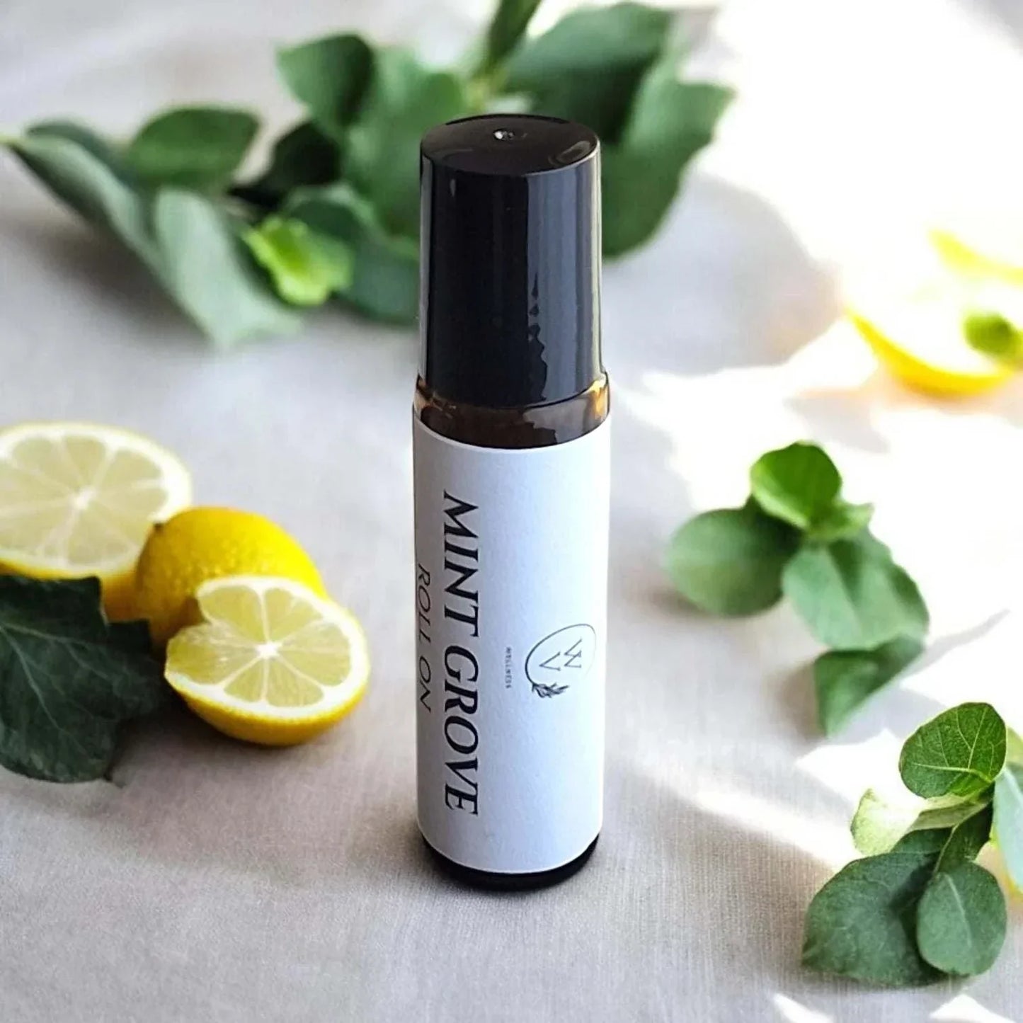 Mint Grove Roll-On essential oil blend with eucalyptus, peppermint, lemon, rosemary, and tea tree.