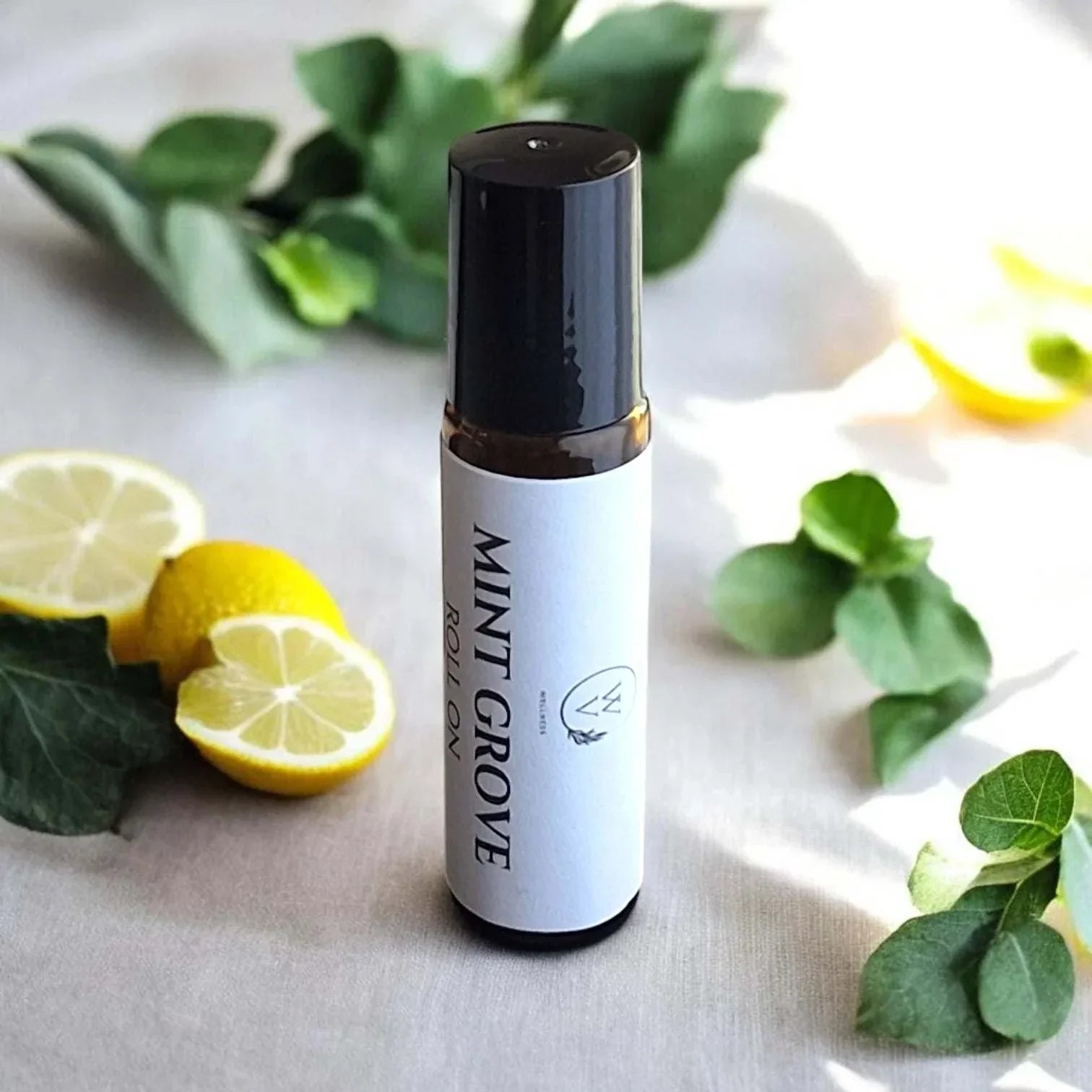 Mint Grove Roll-On essential oil blend with eucalyptus, peppermint, lemon, rosemary, and tea tree.