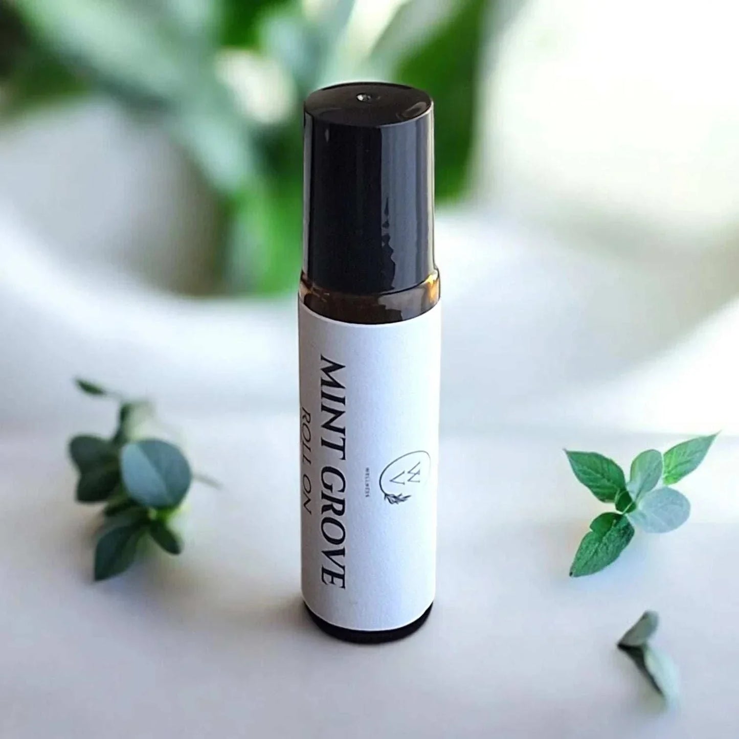 Mint Grove botanical roll-on with a clean herbal-mint aroma and bright citrus notes