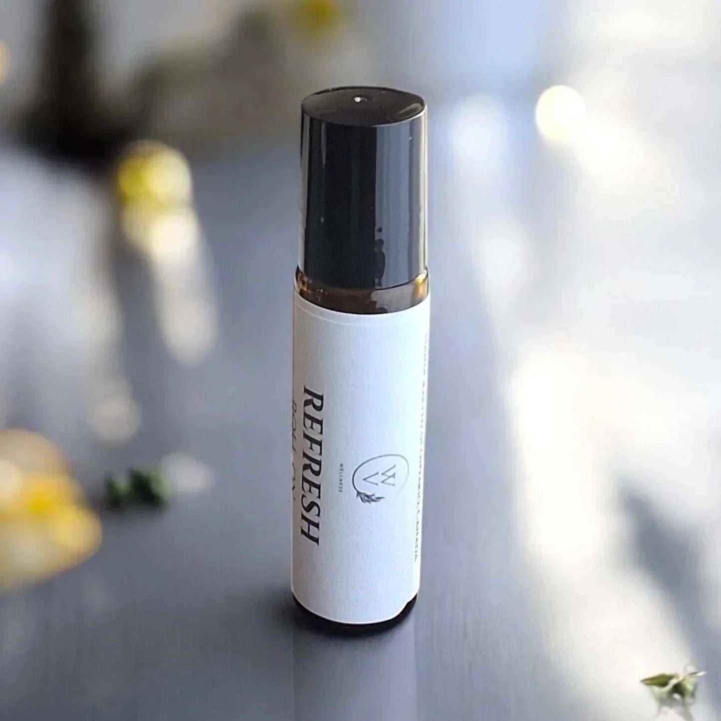 Refresh botanical roll-on with bright herbal-citrus aroma and crisp green notes