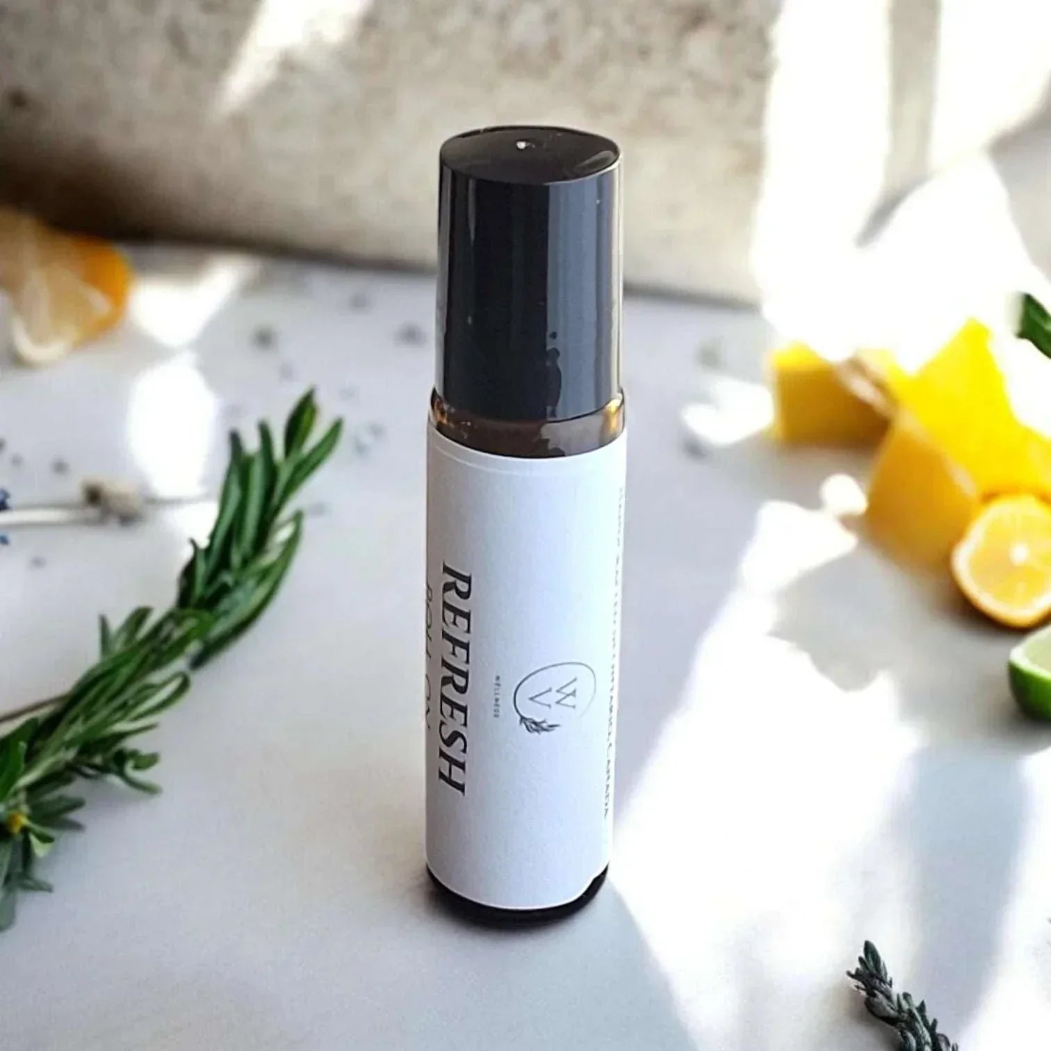Refresh Roll-On essential oil blend with lavender, sweet orange, rosemary, lime, and frankincense