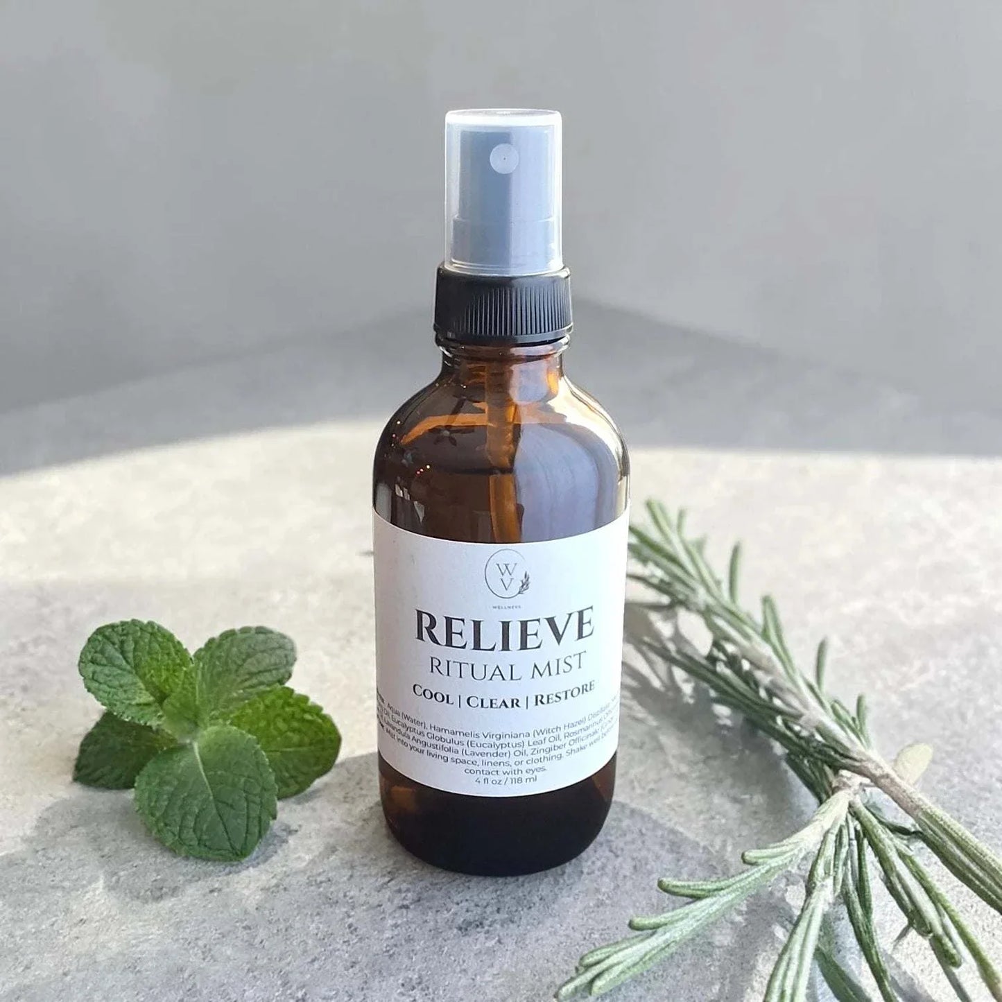Relieve Ritual Mist cooling herbal essential oil room spray with peppermint, eucalyptus, rosemary, lavender, and ginger.