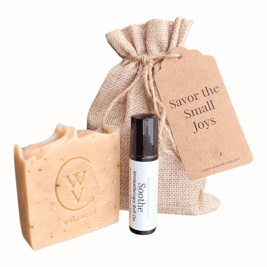 Simple Joy gift set featuring honey lavender soap and aromatherapy roll-on in burlap bag.