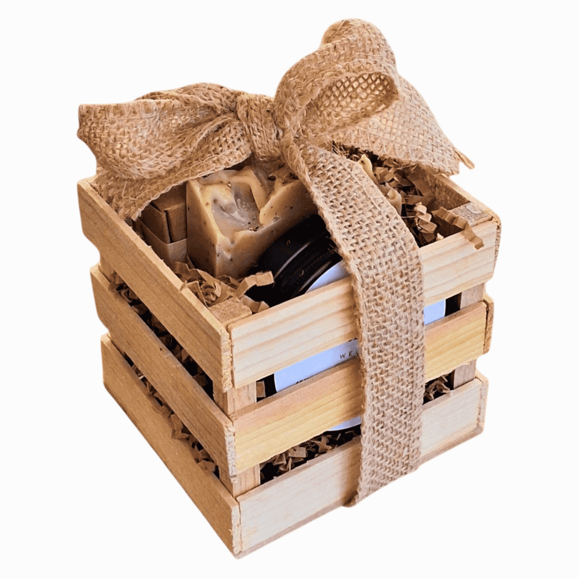 Natural self-care gift set in wooden box with soap, shampoo bar, and deodorant.