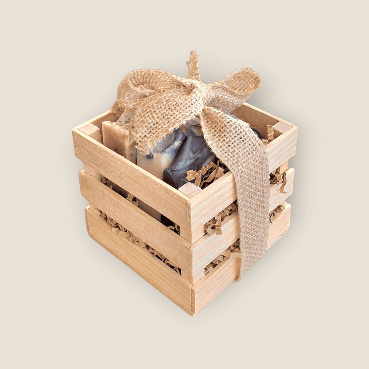 Tranquil Trio natural self-care gift set: three soaps in a wooden box with burlap ribbon and kraft tag.