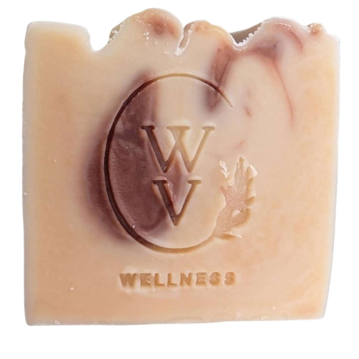 Close-up of Cocoa Cream cold process soap showing cocoa marbling and embossed WV detail