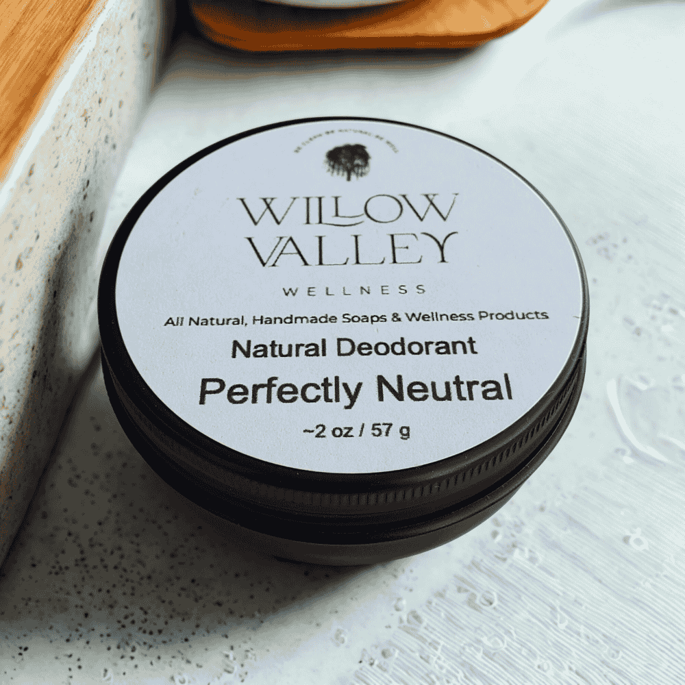 Aluminum-free natural deodorant in a black container, labeled Perfectly Neutral by Willow Valley Wellness