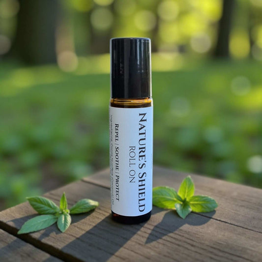 Nature’s Shield roll-on bottle with a white label resting on a natural wood table, showcasing its compact, travel-friendly design.