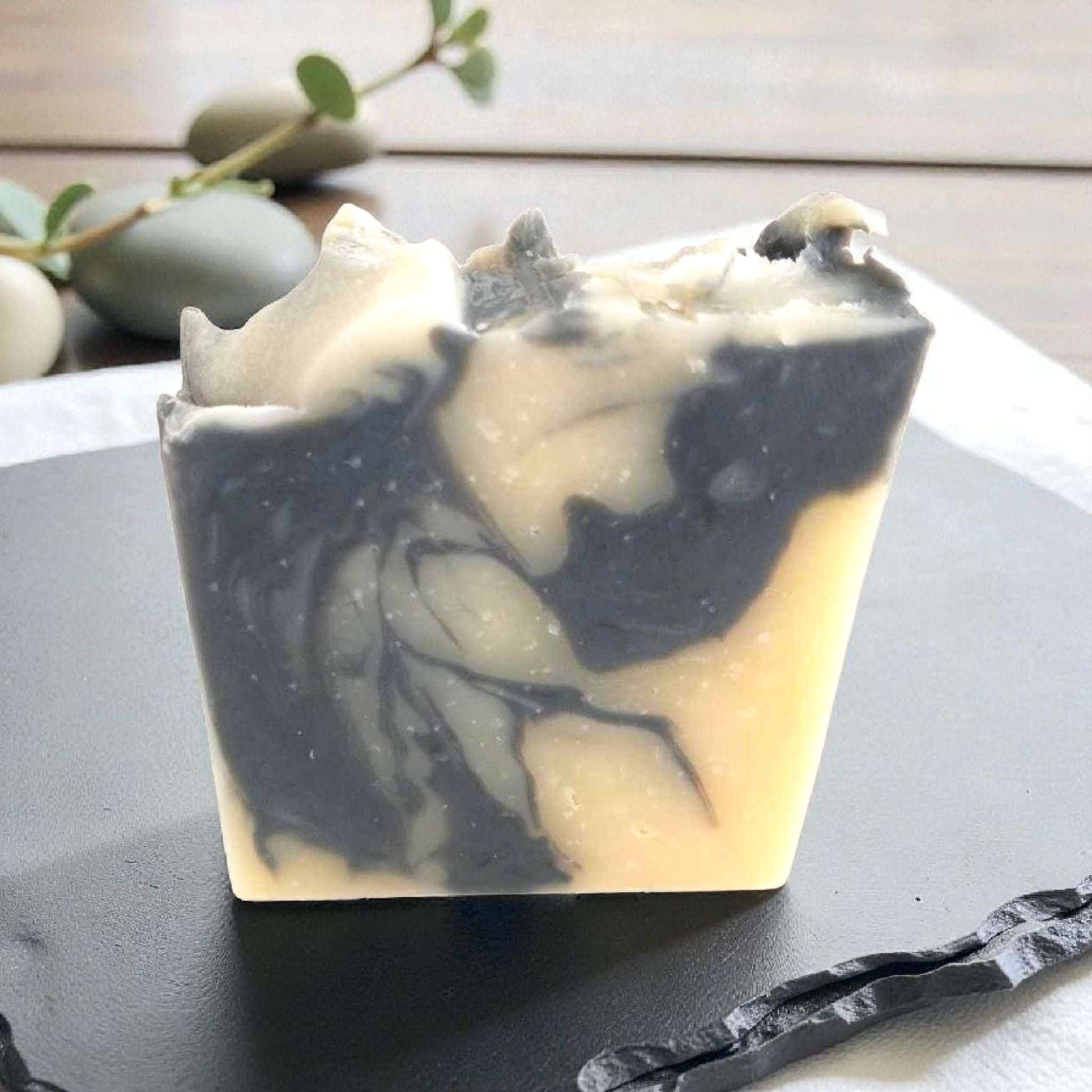 Nomad Soap bar with activated charcoal and woodsy cedarwood lemon scent