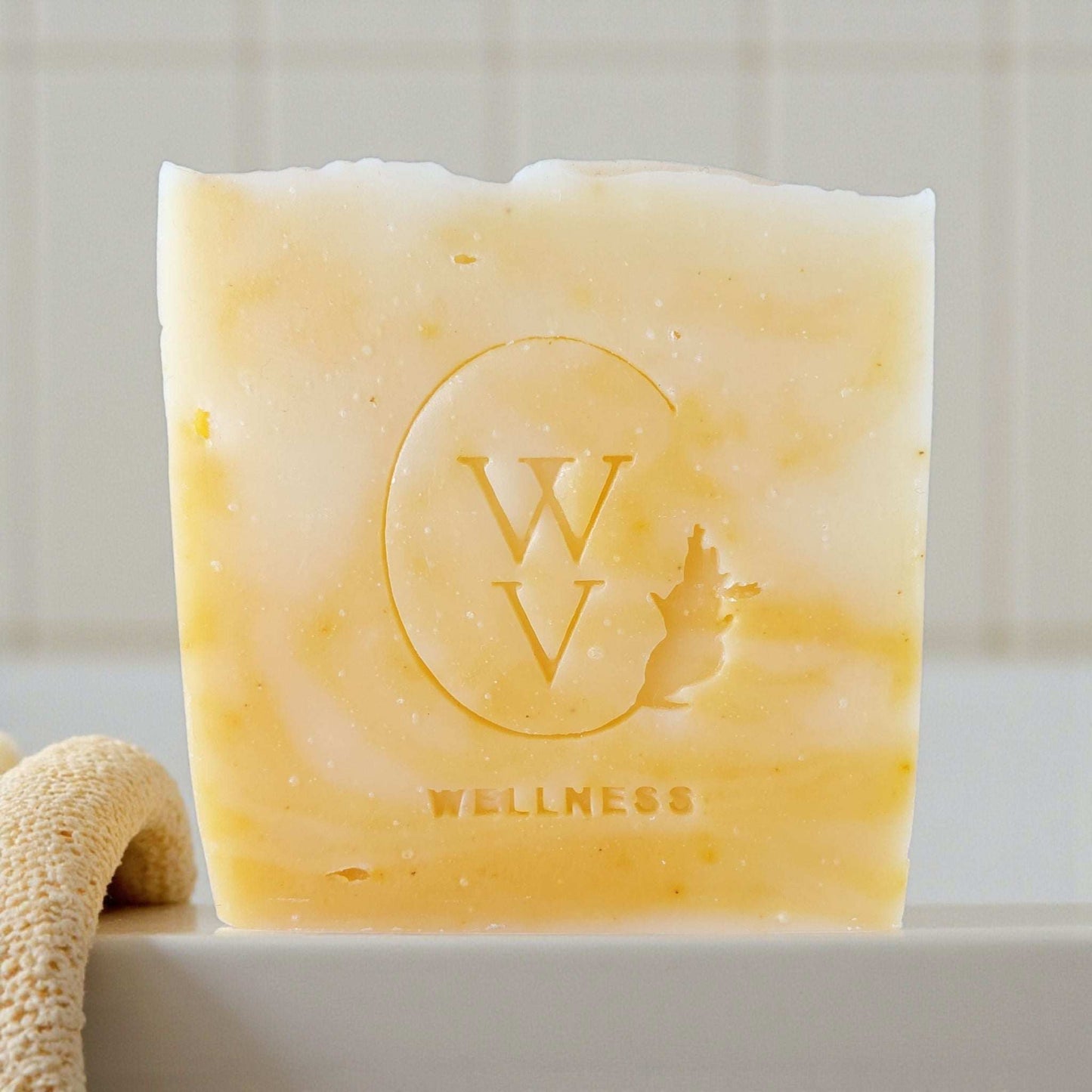 Orange Patchouli soap bar with turmeric swirl, scented with essential oils for a natural, earthy, and skin-nourishing cleanse