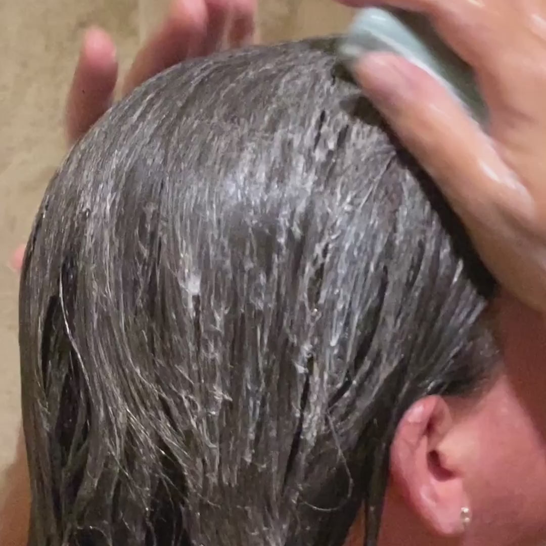 Shampoo bar applied to wet hair and massaged into a rich lather before rinsing