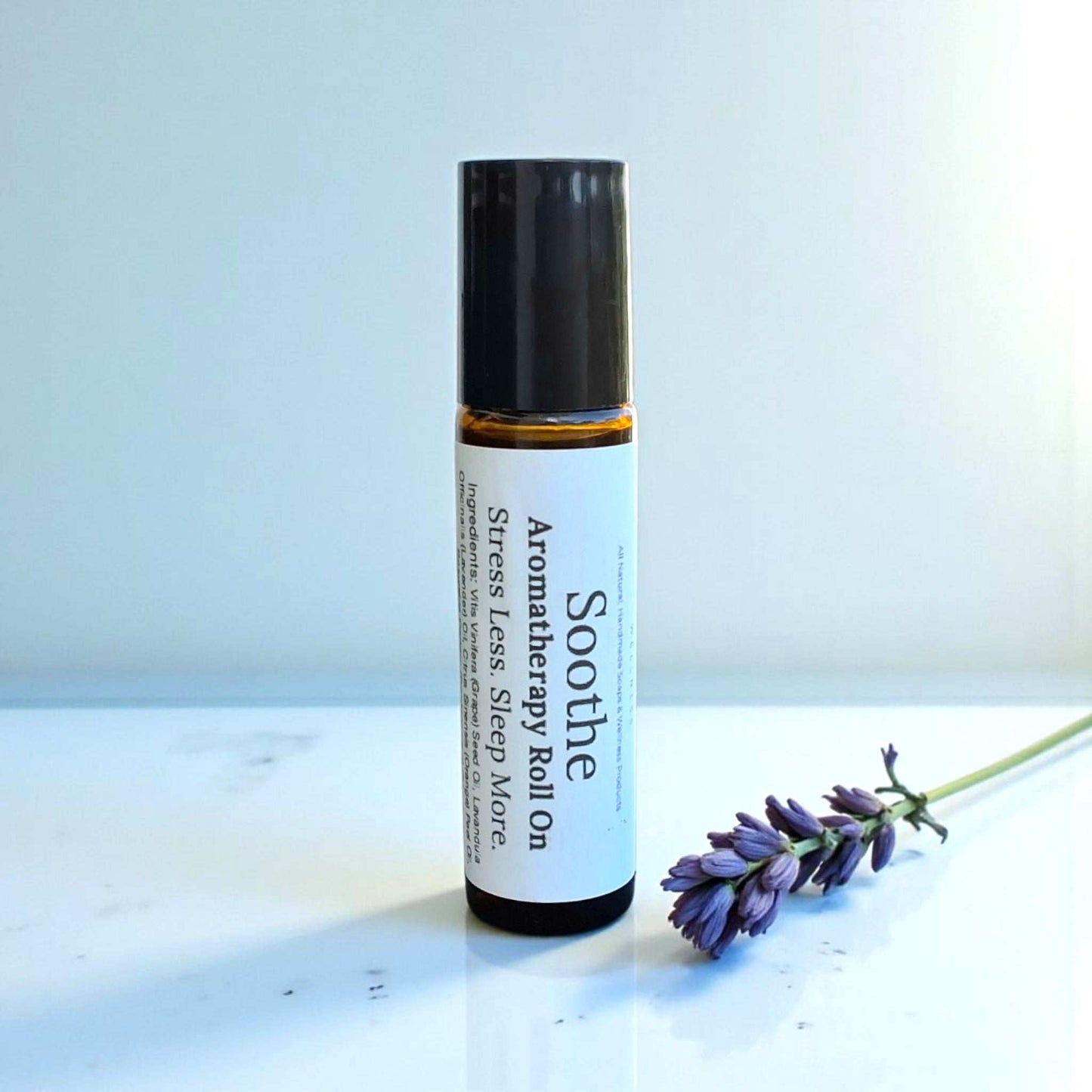 Soothe Roll-On with lavender, orange, and frankincense essential oils in a calming, citrusy aromatherapy blend