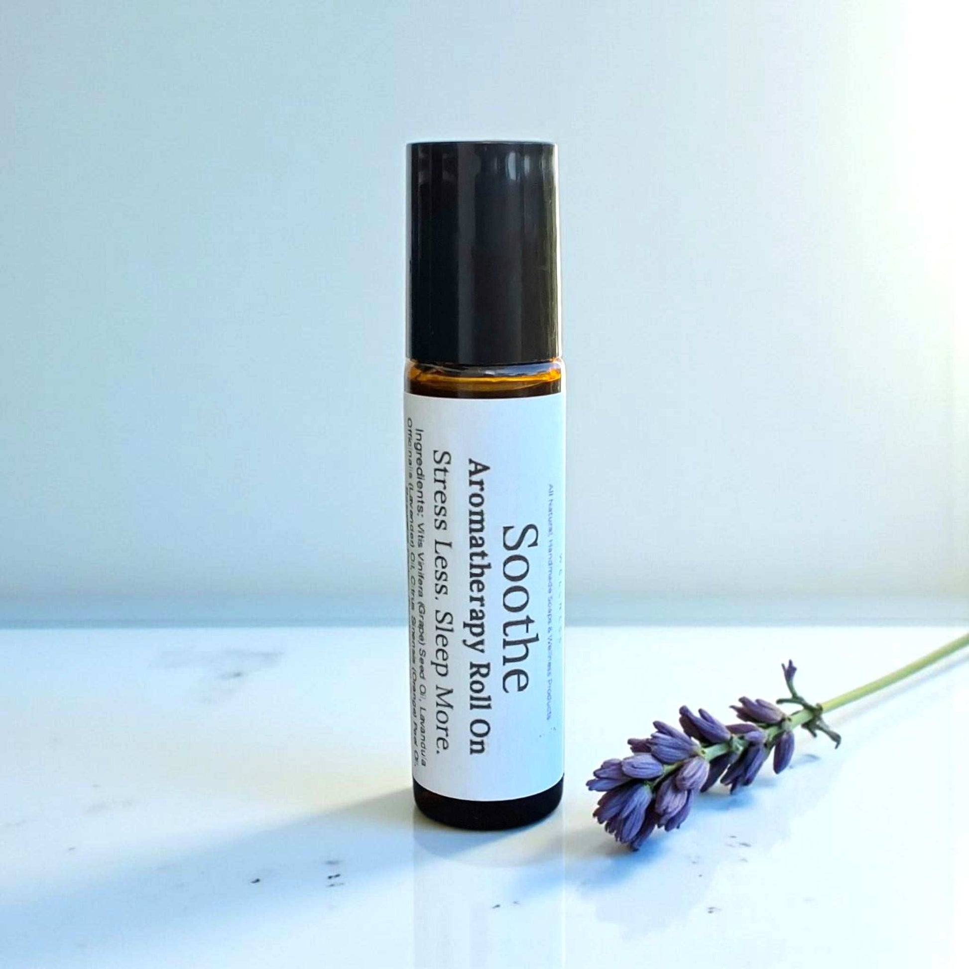 Soothe Roll-On with lavender, orange, and frankincense essential oils in a calming, citrusy aromatherapy blend